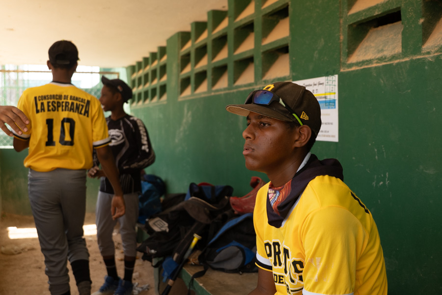 Dominican Baseball players at practice in the dugout